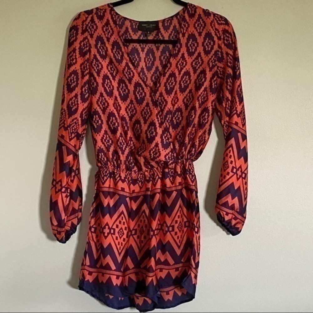 ROMEO + JULIET COUTURE romper in orange and navy.